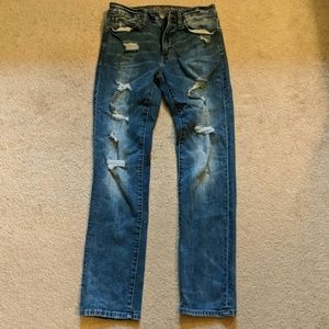 American Eagle ripped blue extreme flex jeans